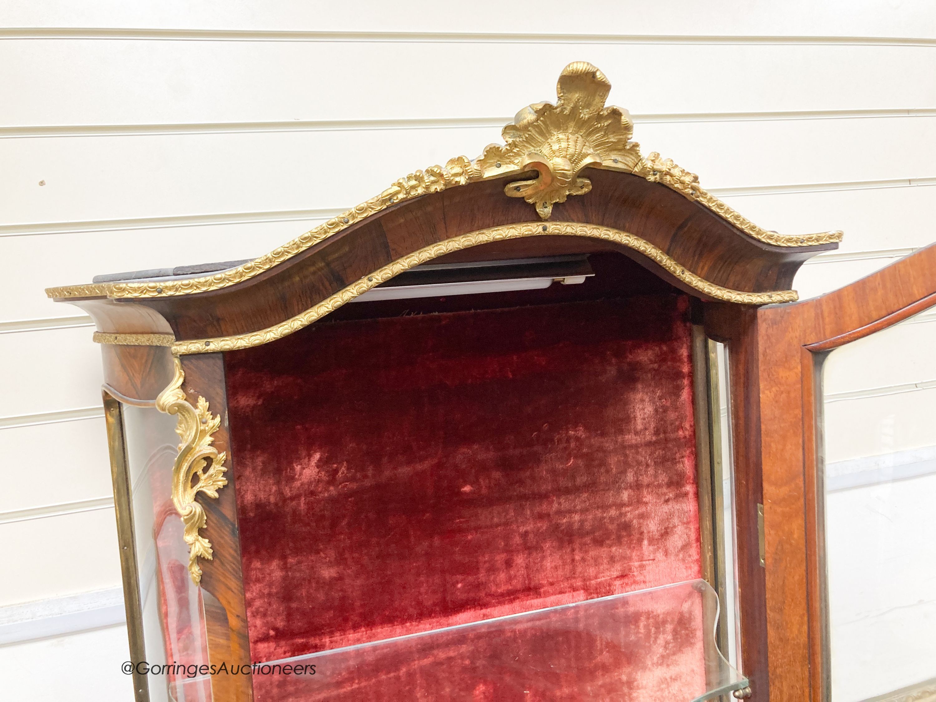 A Louis XV style kingwood bombe vitrine, with Vernis Martin style panels and ormolu mounts, width 74cm, depth 40cm, height 176cm